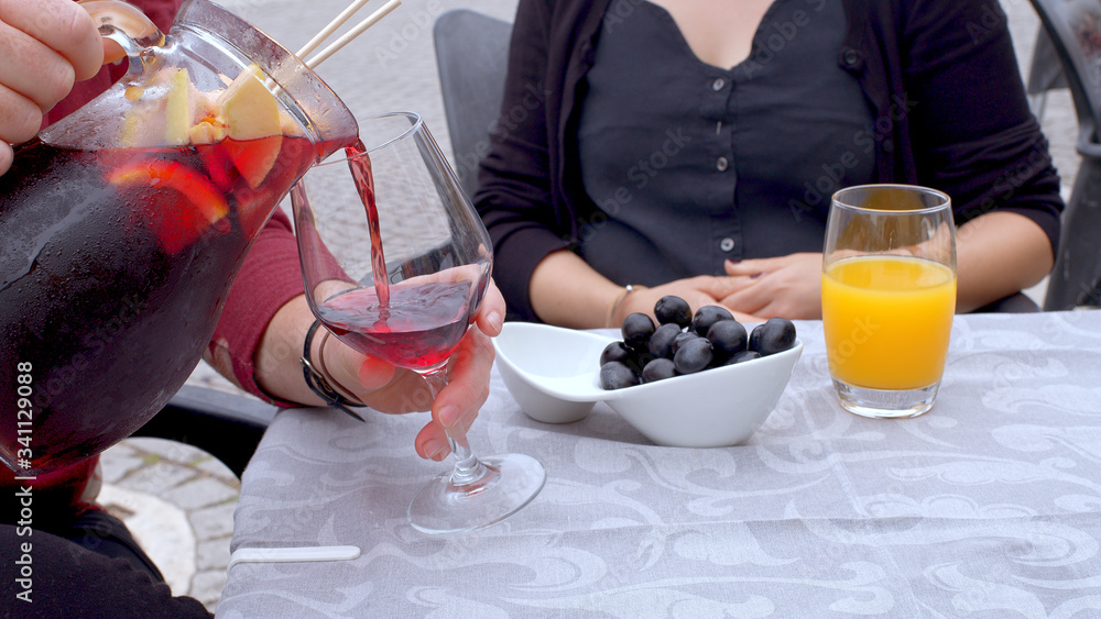 Fototapeta premium Drinking Sangria in the city of Porto - travel photography