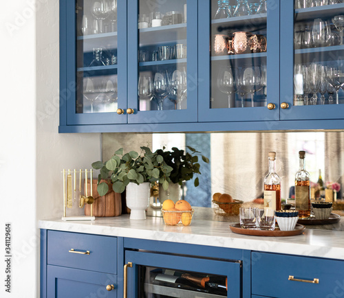 Kitchen cabinet with kitchenwares photo
