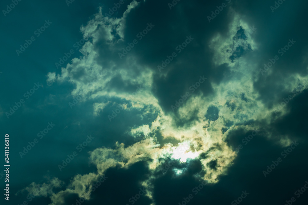 Background of overcast clouds with light shining through the sky. Background of overcast clouds with light shining through the sky.