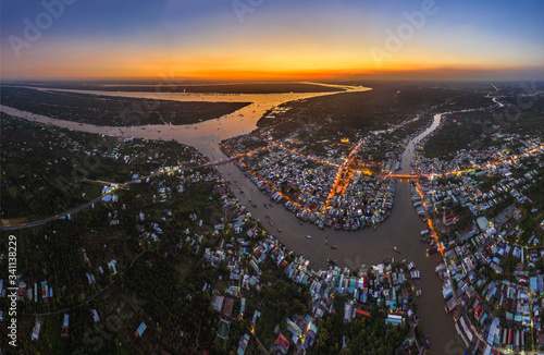 Aerial view of Cai Be floating market on Tien Giang river, Vietnam. Near the ...
