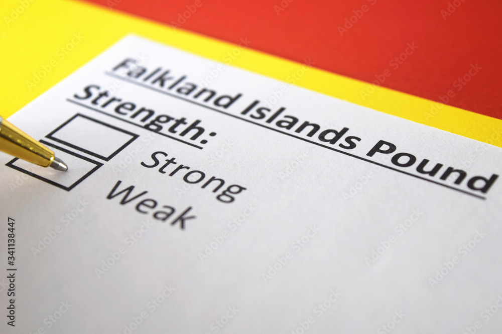 Fototapeta premium One person is answering question about strength of Falkland Islands Pound.