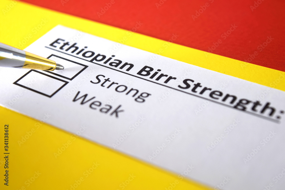 One person is answering question about strength of ethiopian, birr One person is answering question about strength of ethiopian, birr
