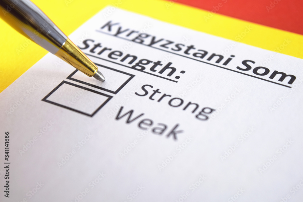 One person is answering question about strength of Kyrgyzstani Som. One person is answering question about strength of Kyrgyzstani Som.