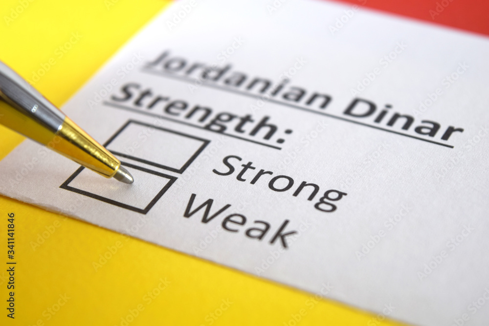 One person is answering question about strength of Jordanian Dinar. One person is answering question about strength of Jordanian Dinar.