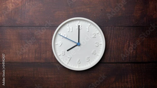 Wallpaper Mural The Time On The Clock Eight. White Clock With The Blue Arrow With The Arabic Numerals On An Brown Wooden Background. Torontodigital.ca