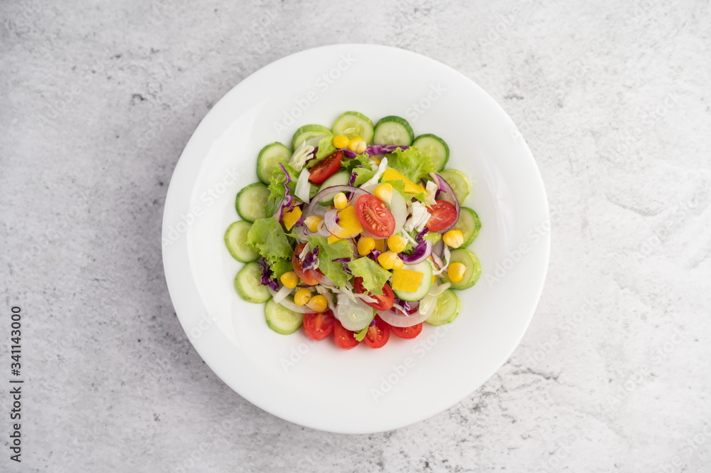 Vegetable salad with boiled eggs in a white dish. Vegetable salad with boiled eggs in a white dish.