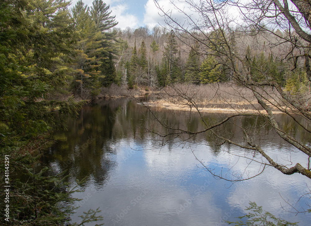 Beautiful Muskoka River in northern Ontario on a sunny day in early spring Beautiful Muskoka River in northern Ontario on a sunny day in early spring