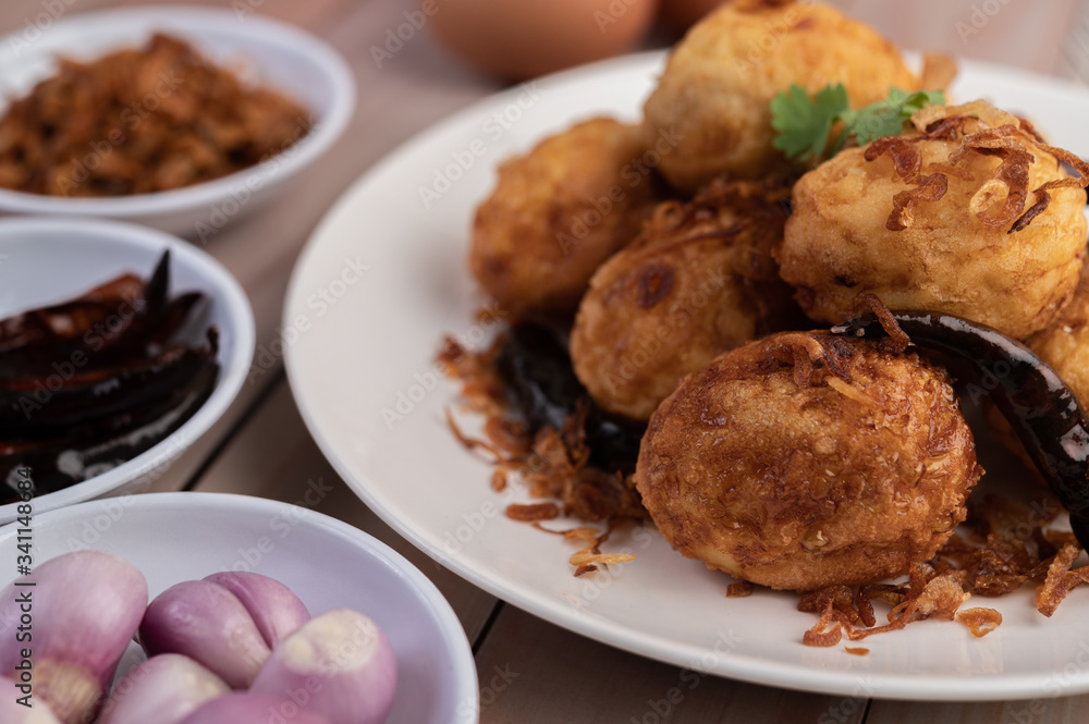Boiled eggs stir-fried with tamarind sauce. Boiled eggs stir-fried with tamarind sauce.