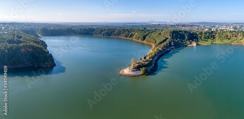 Aerial view of To Nung lake or T’nung lake near Pleiku city, Gia Lai province, Vietnam. To Nung lake or T’nung lake on the lava background of a volcano that has stopped working