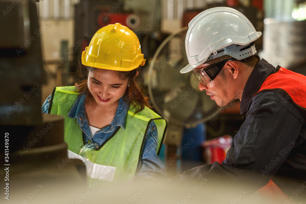 industrial worker background of industrial chief engineer explaining job detail to factory worker in metal work manufacturing workshop industrial worker background of industrial chief engineer explaining job detail to factory worker in metal work manufacturing workshop