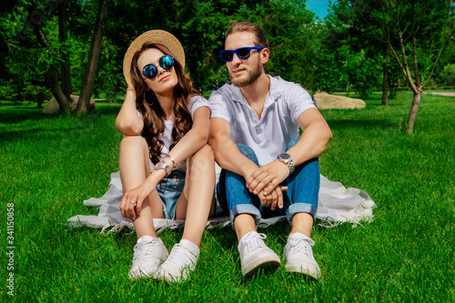 romantic friends in sunglasses