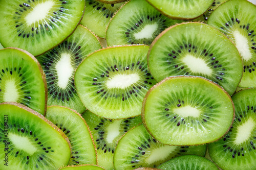 Tela Close up of green kiwi fruit slices