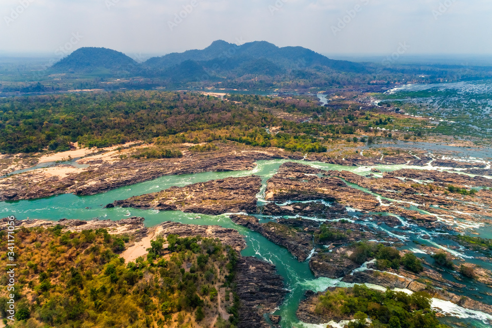 Aerial view of Li Phi waterfall in Laos - Tat Somphamit, don khone, si phan don on four thousand islands in Laos. Landscape of nature in south east asia during summer.