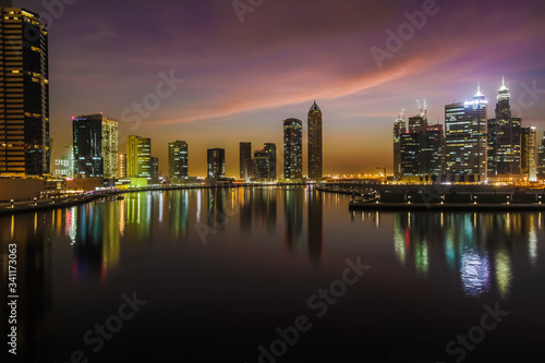 Sunrise over pond in a city. Kuala Lumpur skyline © Дмитрий Громов