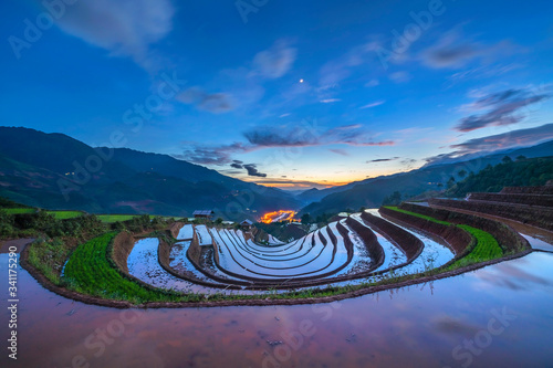 Water on terraces Mu Cang Chai, Yen Bai, Vietnam same world heritage Ifugao rice terraces in Batad, northern Luzon, Philippines. photo