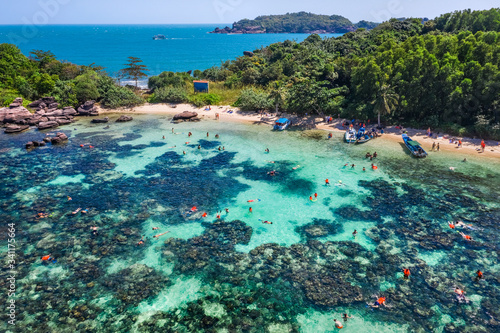 Aerial view of people swimming on the sea and beach on Gam Ghi Phu Quoc island in Thailand bay  Kien Giang  Vietnam.