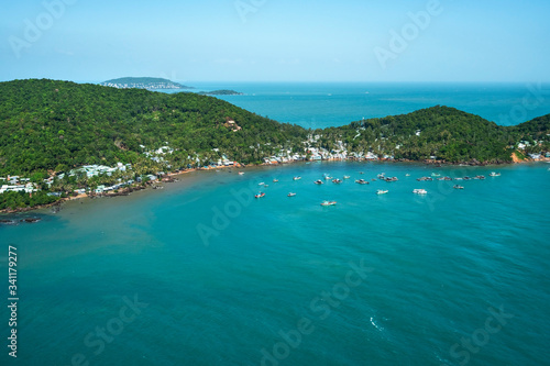 Aerial view of white sand beach and boat on the blue lagoon aqua sea. Royalty high quality free stock image of Gam Ghi island in Phu Quoc, Kien Giang, Vietnam 
