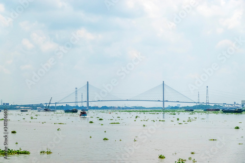 My Thuan bridge, cable-stayed bridge connecting the provinces of Tien Giang and Vinh Long, Vietnam. Famous beautiful bridge of Mekong Delta.   photo