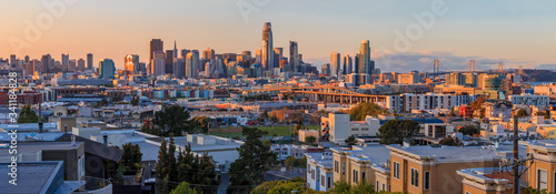 San Francisco city skyline panorama after sunset with city lights  the Bay Bridge and highway leading into the city