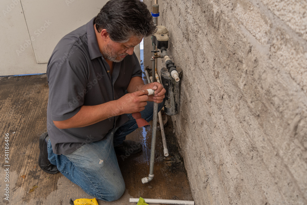 Man fixing a tube