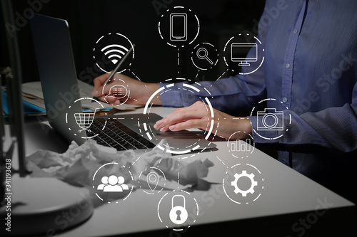 Woman working on laptop at ...