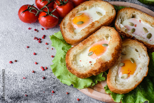 Delicious breakfast with grunts, eggs, avocado and cherry tomatoes