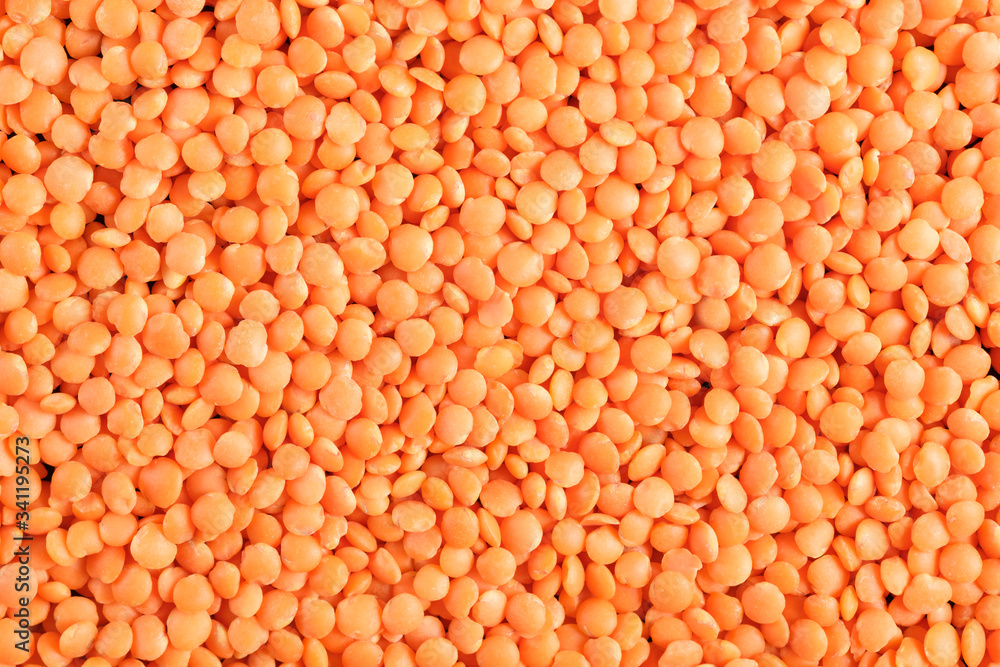 Red lentils background. Flat lay, top view