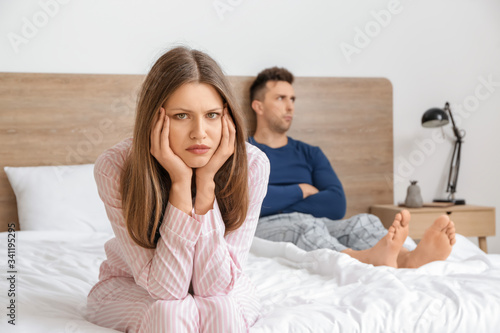 Sad couple after quarrel in...