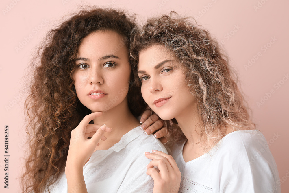Beautiful young women on color background Beautiful young women on color background
