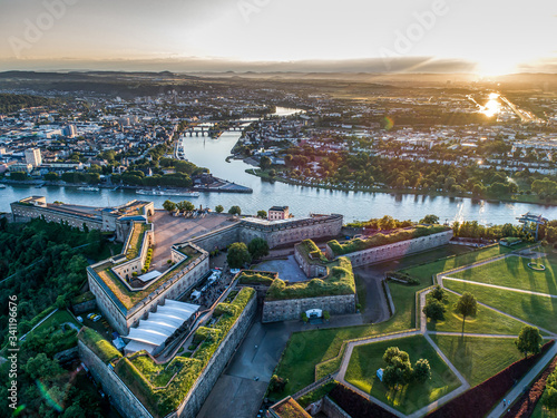 Fotografiet Aerial View of Ehrenbreitstein fortress and Koblenz City in Germany during sunse