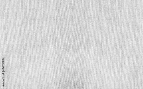 White fabric pattern texture of denim or white jeans.