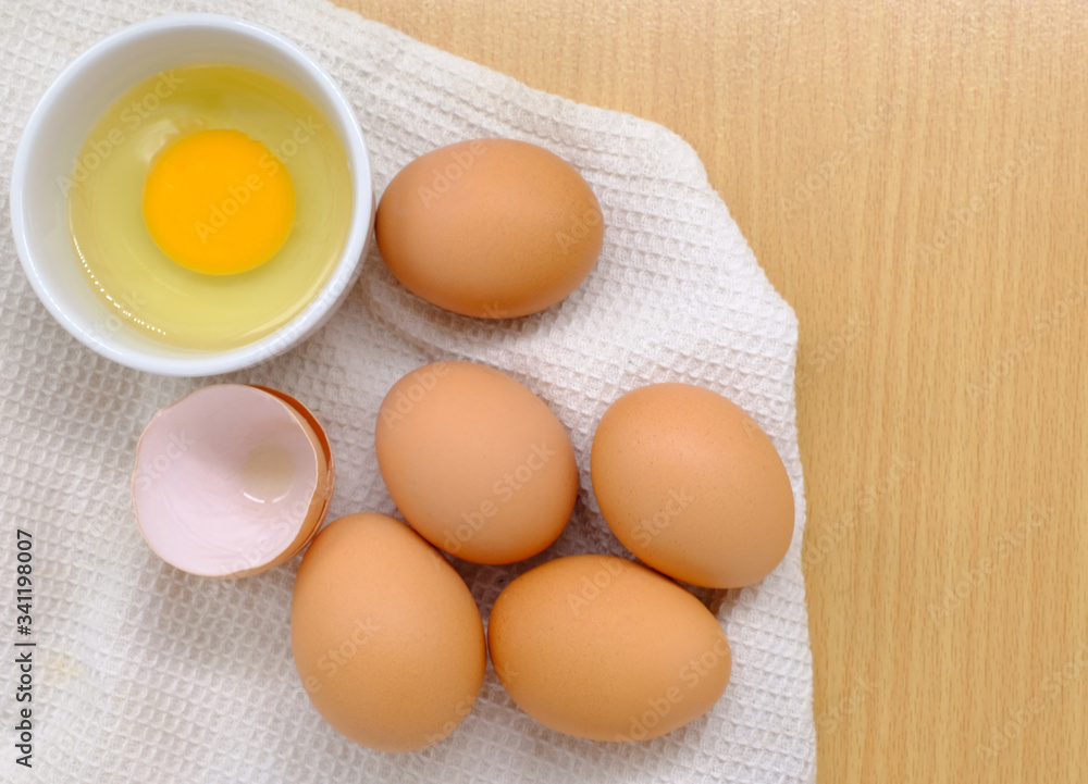 Close-up view of raw chicken eggs on background Close-up view of raw chicken eggs on background