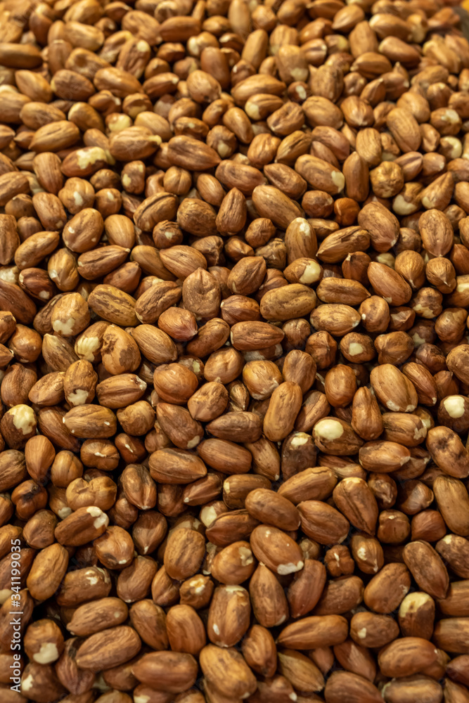 Background made of nuts. Peeled cashew kernels in the market. Healthy, wholesome food. Organic products. Source of vitamins and minerals. Grocery market in Georgia. Background made of nuts. Peeled cashew kernels in the market. Healthy, wholesome food. Organic products. Source of vitamins and minerals. Grocery market in Georgia.