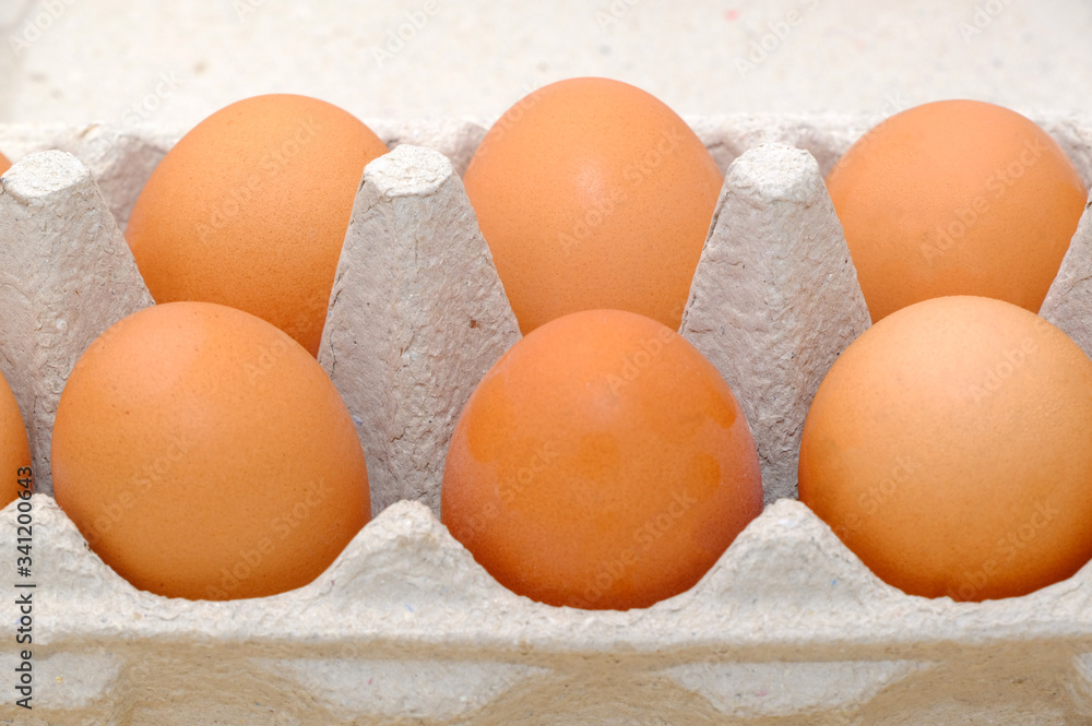 Close-up view of raw chicken eggs on background Close-up view of raw chicken eggs on background