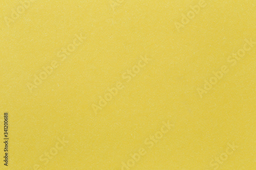Texture of yellow paper cardboard art background.