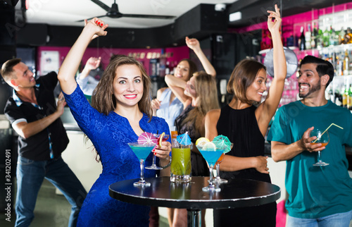 Woman enjoying party in bar