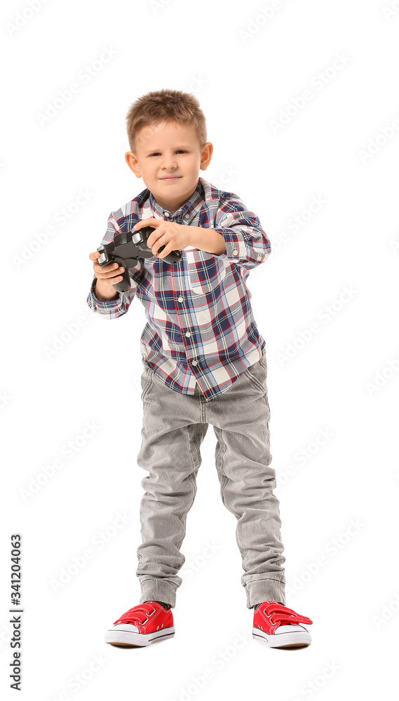 Cute little boy playing video games on white background Cute little boy playing video games on white background