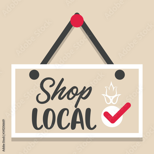 shop local poster with label hanging
