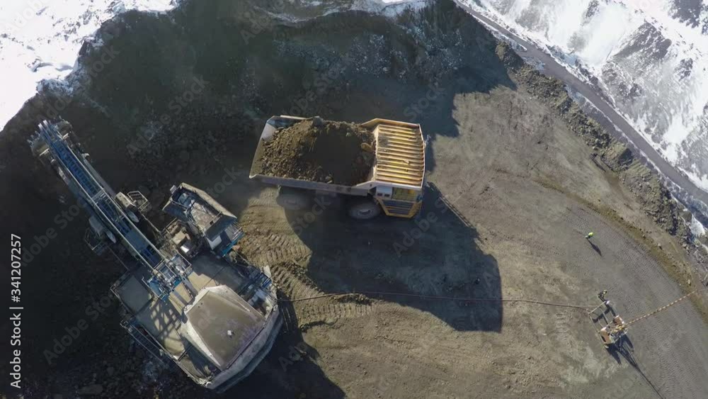 mining truck is loaded in the career in slow motion mining truck is loaded in the career in slow motion