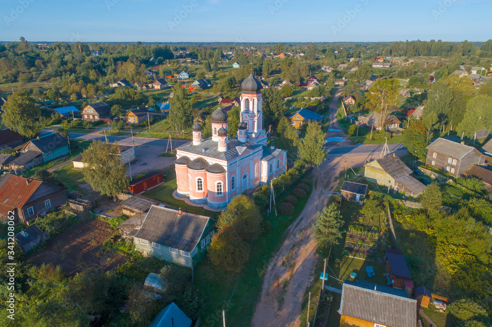 Ancient Trinity Church on a sunny august morning (aerial photography). Kresttsy. Novgorod region, Russia