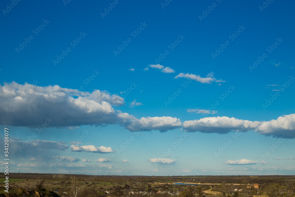 Blue sky with white clouds to the horizon Blue sky with white clouds to the horizon
