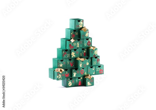Festive calendar with gifts inside, surprise chocolates, Advent Calendar isolated Christmas tree shaped green boxes