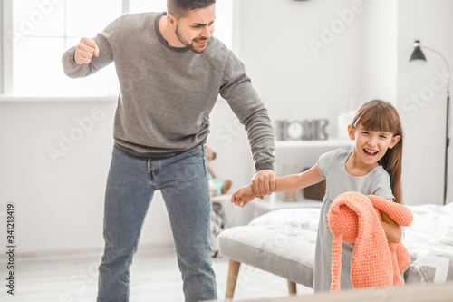Angry father threatening hi...