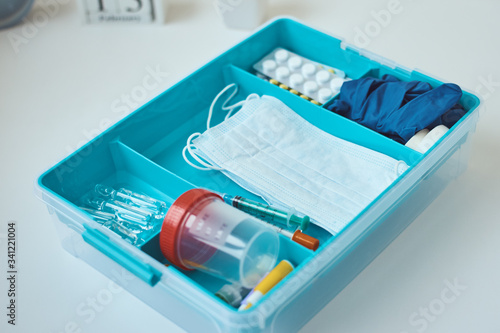 First aid kit  close up. Home medicine box with a medical items. Healthcare and medicine concept.