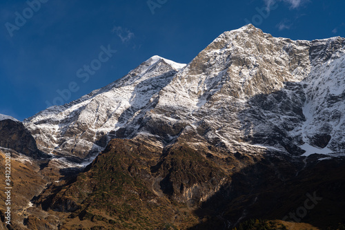 Snow mountains peak around Lho village in Manaslu circuit trekking, Himalaya mountains range in Nepal © skazzjy