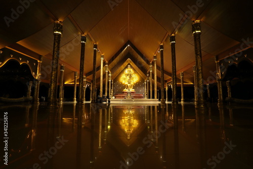 Buddha statue in the church at Sirindhorn Wararam Phu Phrao temple in Ubon Ratchathani, Thailand photo