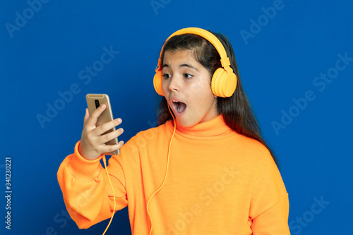 Adorable preteen girl with yellow jersey
