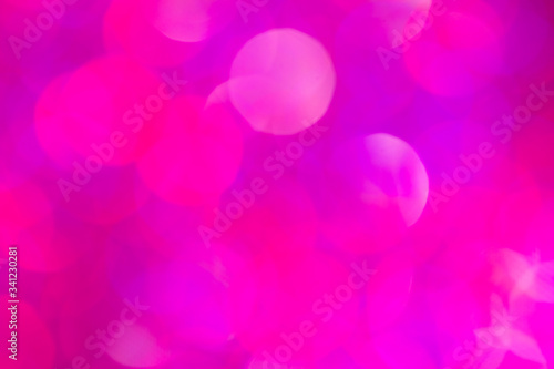 Abstract blurred pink bokeh lights background