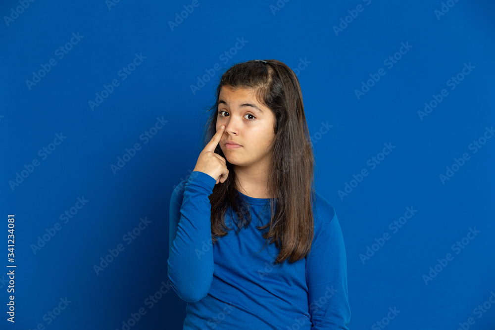 Brunette young woman wearing a yellow T-shirt Brunette young woman wearing a yellow T-shirt