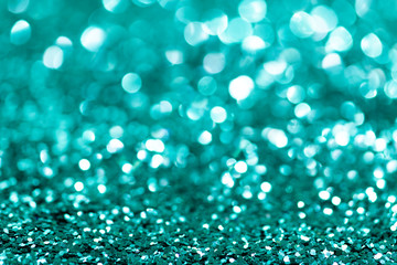 Shiny turquoise glitter textured background